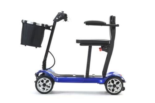 Side view of a blue foldable electric mobility scooter with seat and basket.