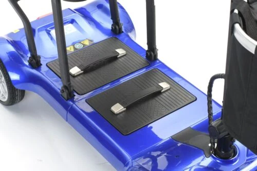 Close-up of the blue base of a foldable mobility scooter with footrests.