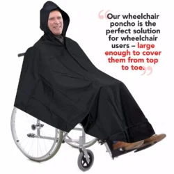 Person in a wheelchair wearing a black waterproof poncho with hood.