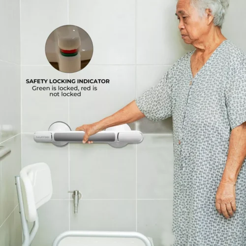 Elderly person using a suction grab shower handle with safety lock indicator.