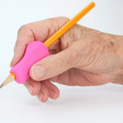 Elderly hand holding a pencil with a pink grip.