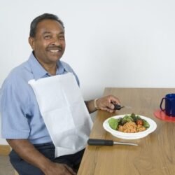 Disposable Adult Bibs with Front Pocket - Perfect for Dining, Dental & Care Needs - Image 1