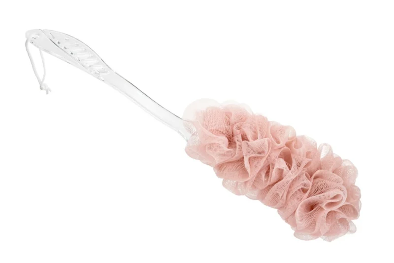 Pink mesh sponge bath brush with a long transparent handle.