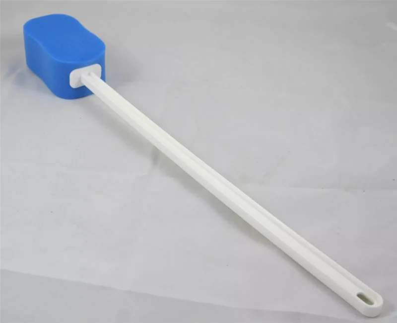 Blue contoured bath sponge with a long white handle.