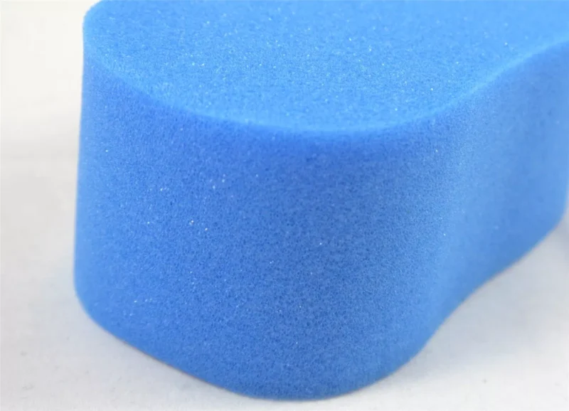 Close-up view of a blue sponge surface.
