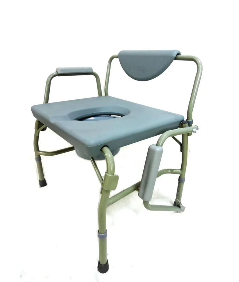Extra wide steel commode chair with padded armrests and backrest.