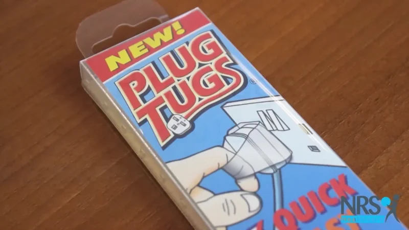Plug Tugs packaging with illustration of a hand pulling a plug.