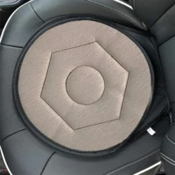Beige rotating cushion on a car seat, showcasing its hexagonal pattern.