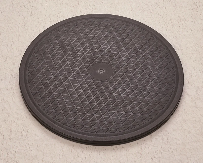 Black round transfer turntable with textured surface.