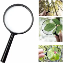Black handheld magnifier with 5X magnification shown in various uses.