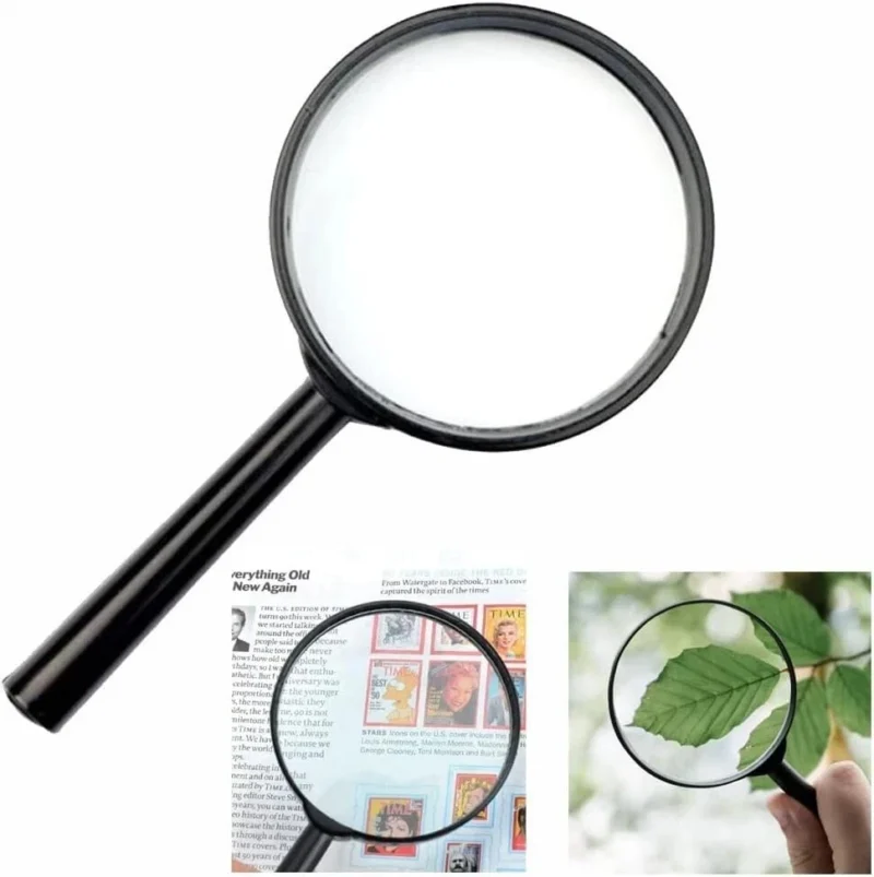 Black handheld magnifier with 5X magnification lens.