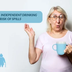 Person holding a blue two-handled mug with text about independent drinking.