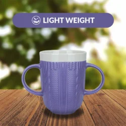 Purple two handled mug on a wooden surface with 'Light Weight' text above.