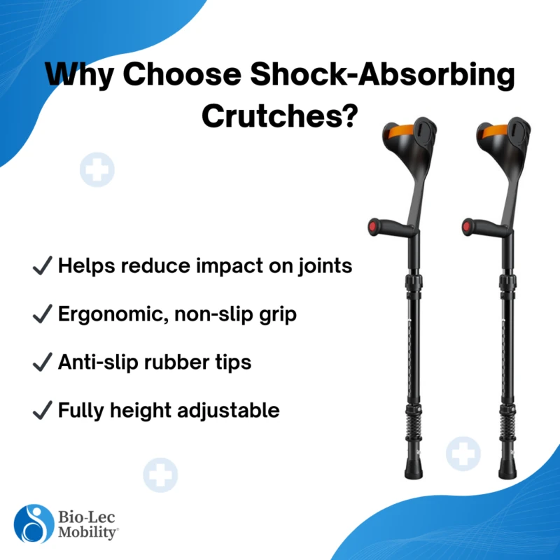 Two black crutches with ergonomic handles and anti-slip tips.