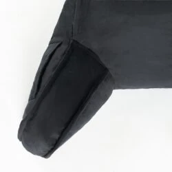 Close-up of black cuddle cushion arm on white background.