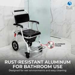 Folding aluminium shower commode wheelchair with padded seat in a bathroom.