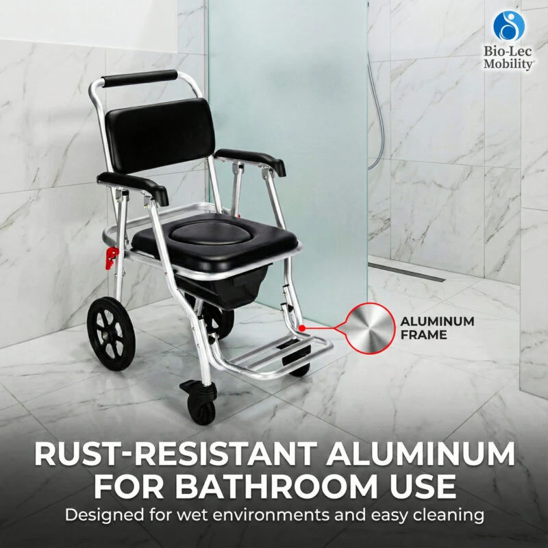 Folding aluminium shower commode wheelchair with padded seat in a bathroom.