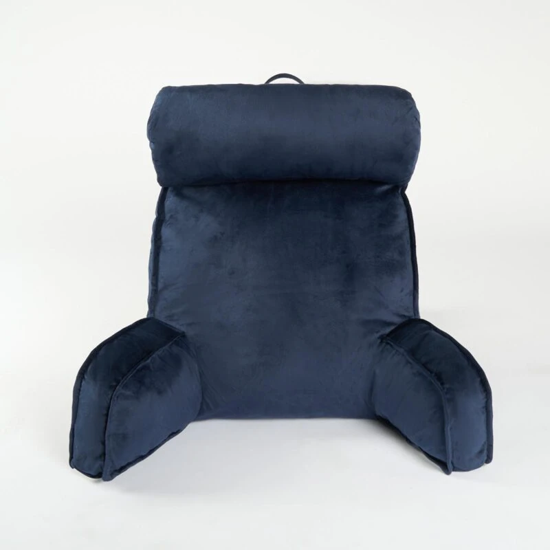 Navy lumbar support pillow with armrests and headrest.