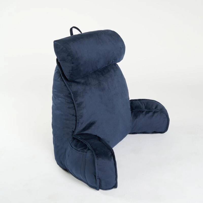 Navy lumbar support pillow with ergonomic design and velvet fabric.