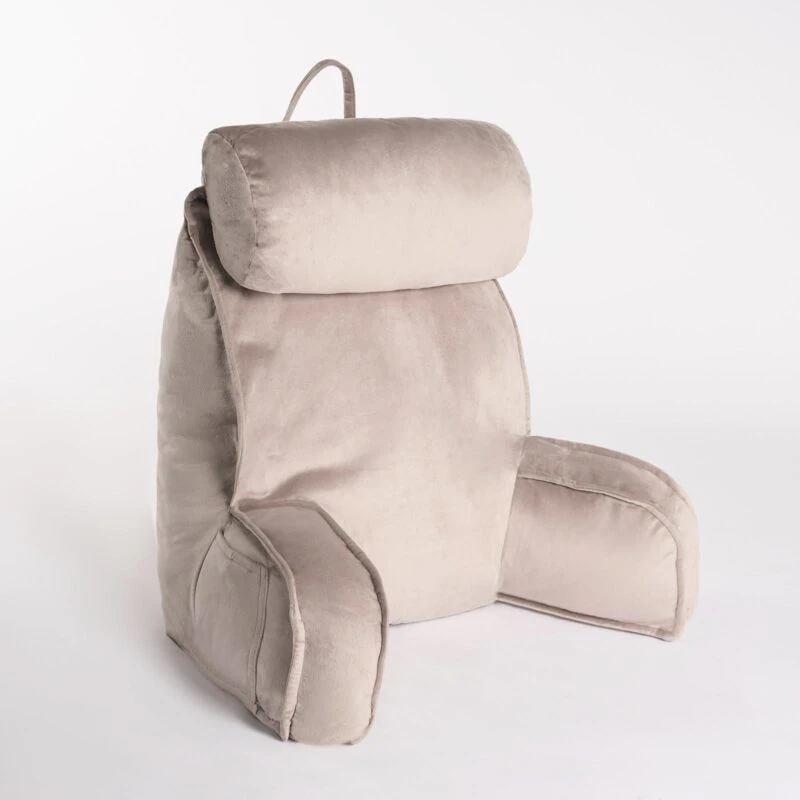 Mink lumbar support pillow with ergonomic design and headrest.