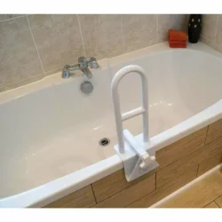 White grab bar installed on the edge of a bathtub.
