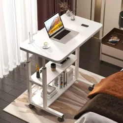 White over bed table with laptop, cup, and shelves.