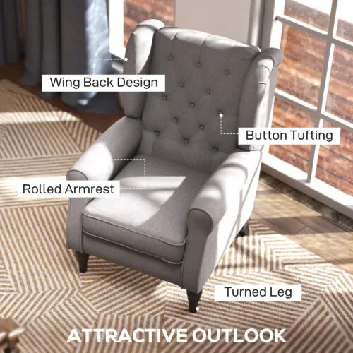 Grey wingback armchair with button tufting and rolled armrests.