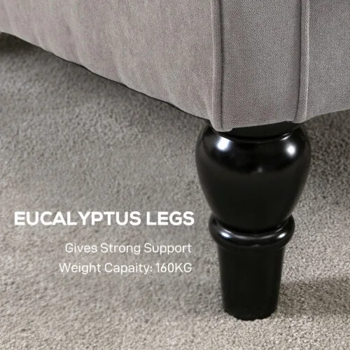 Close-up of black wooden leg on a grey fabric chair with text about eucalyptus legs.