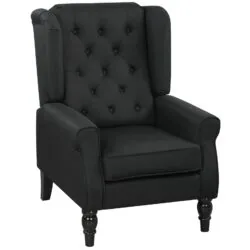 Black tufted wingback armchair with wooden legs.