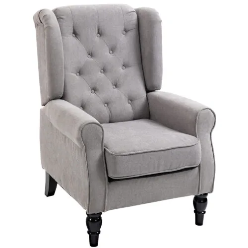 Grey retro wingback armchair with tufted back and wooden legs.