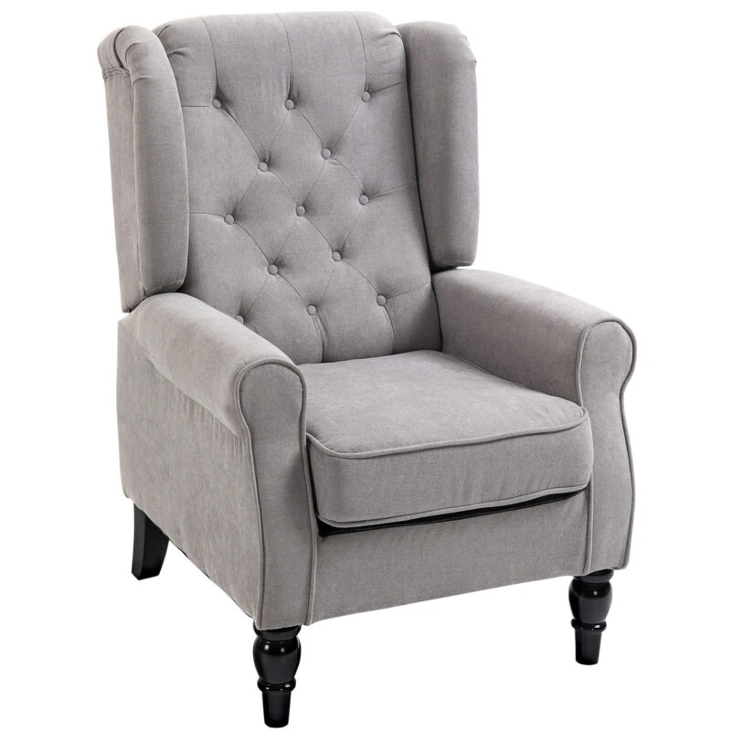 Grey retro wingback armchair with tufted back and wooden legs.