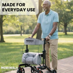 Person using MobiWalk SIT-RIGHT Rollator Walker outdoors.