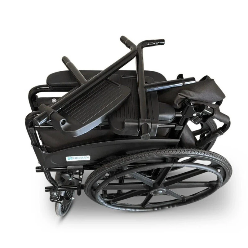 Folded black wheelchair with large rear wheels and footrests.