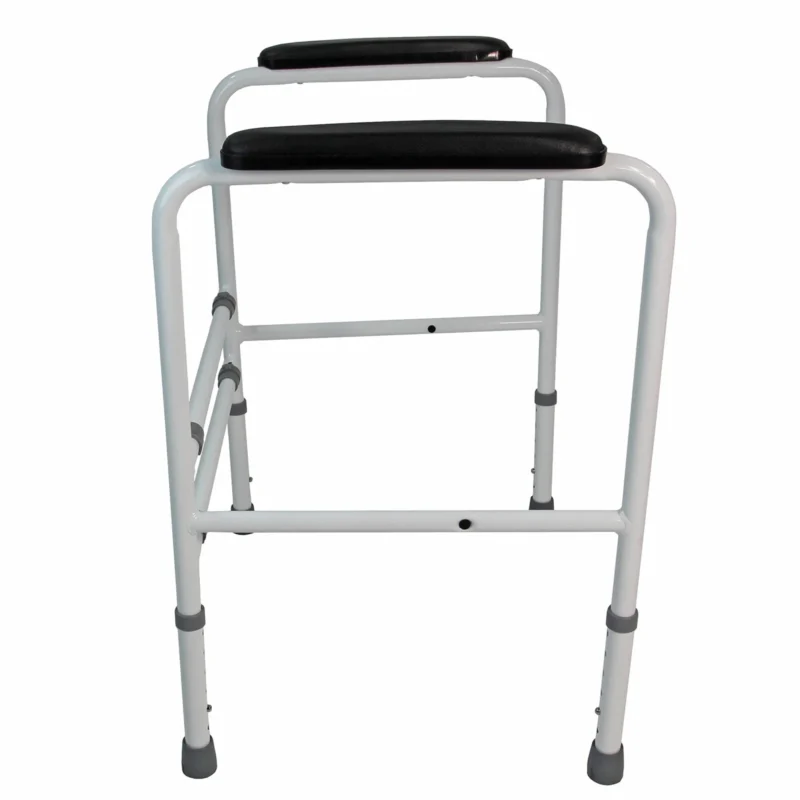 White metal toilet frame with black padded handrails.