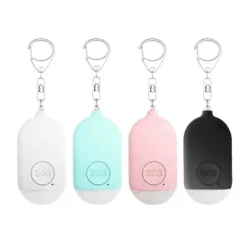 Four Safe Sound personal alarms in white, blue, pink, and black with SOS button.