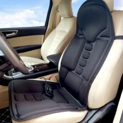 Black heated massage seat cushion placed on a car seat with a remote control.