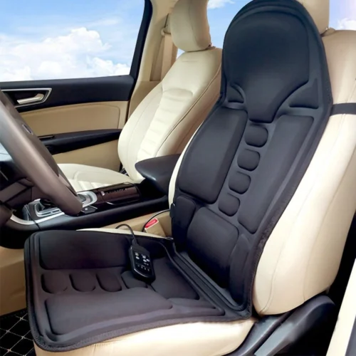 Black heated massage seat cushion placed on a car seat with a remote control.