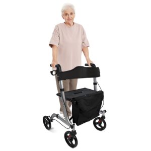 Elderly person using a lightweight foldable rollator with seat and bag.