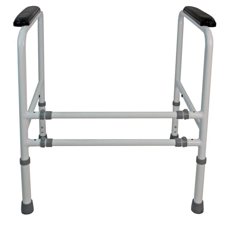 White toilet frame support with padded handrails and adjustable legs.
