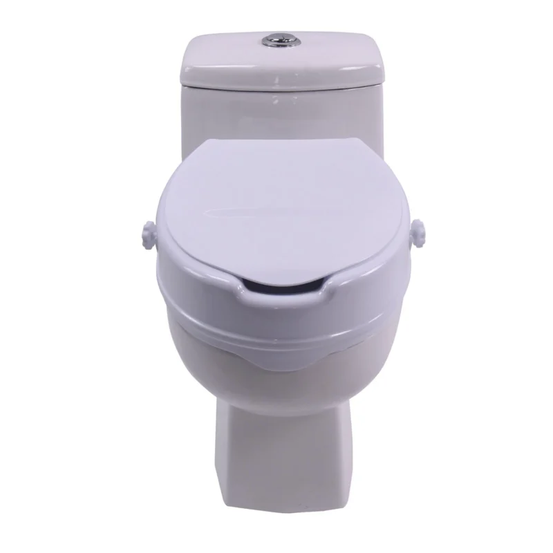 Raised toilet seat aid with lid installed on a toilet.