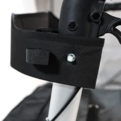 Close-up of a black fastening on a rollator frame.