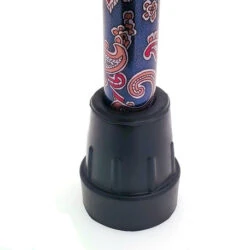 Rubber ferrule attached to a decorative walking stick with a colorful pattern.