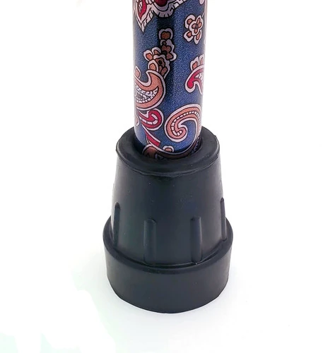 Rubber ferrule attached to a decorative walking stick with a colorful pattern.