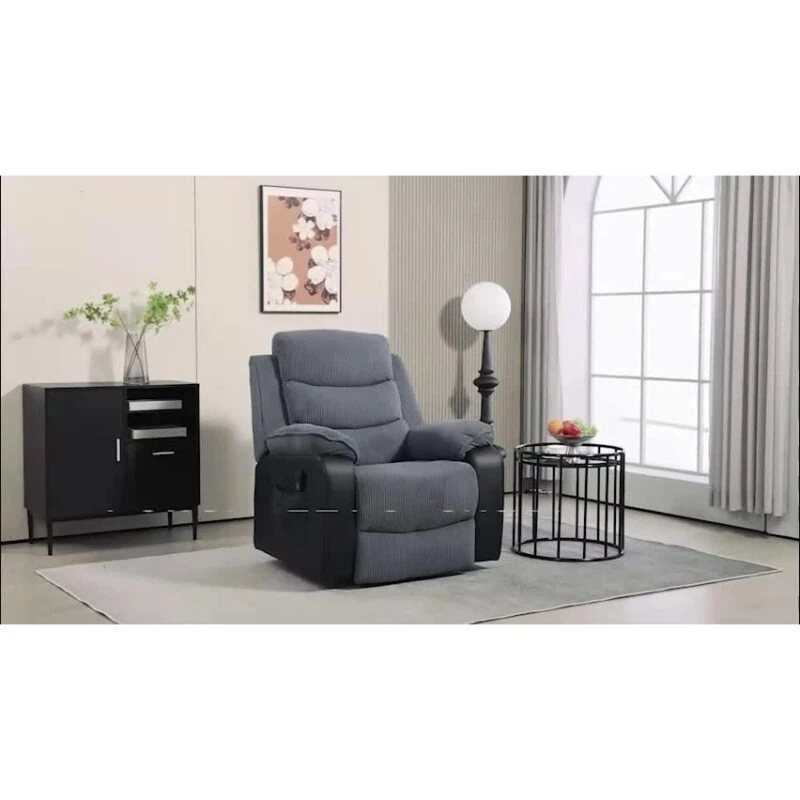 Dark grey power lift recliner chair in a living room setting.