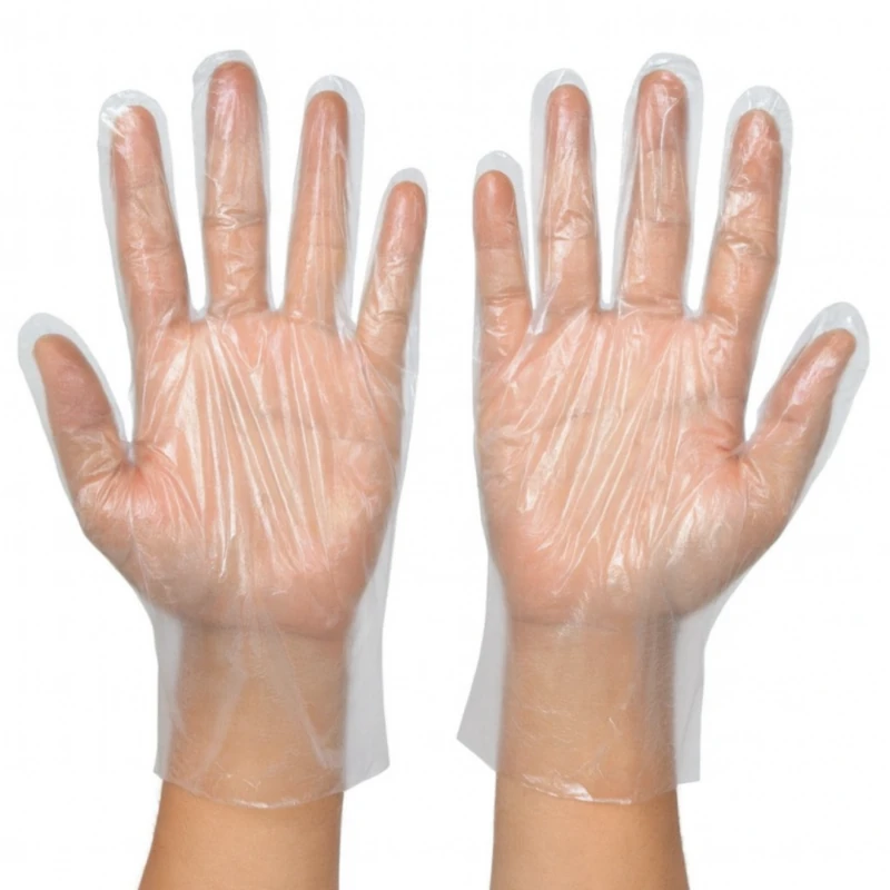 Clear disposable gloves on both hands against a white background