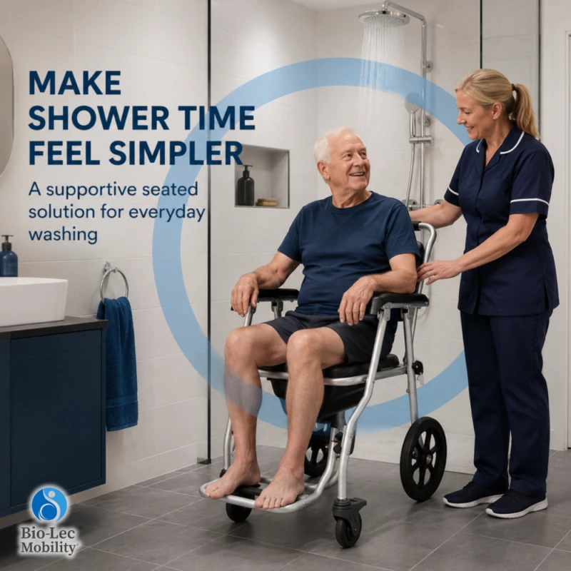 Elderly man seated in the shower commode wheelchair in a walk-in shower with carer support