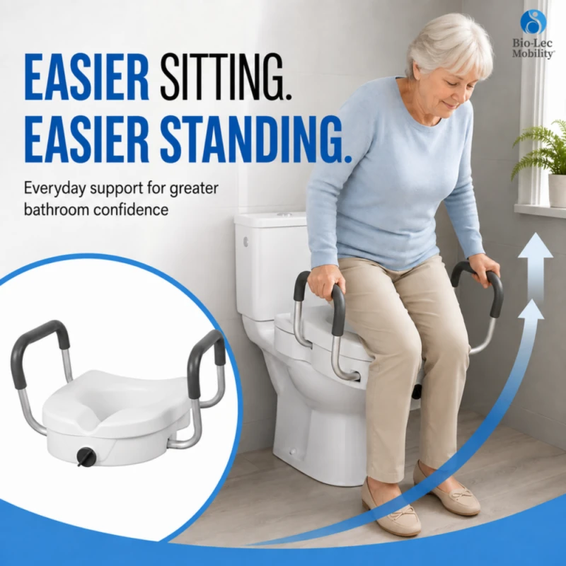 Older woman holding the padded handles to sit down on a raised toilet seat